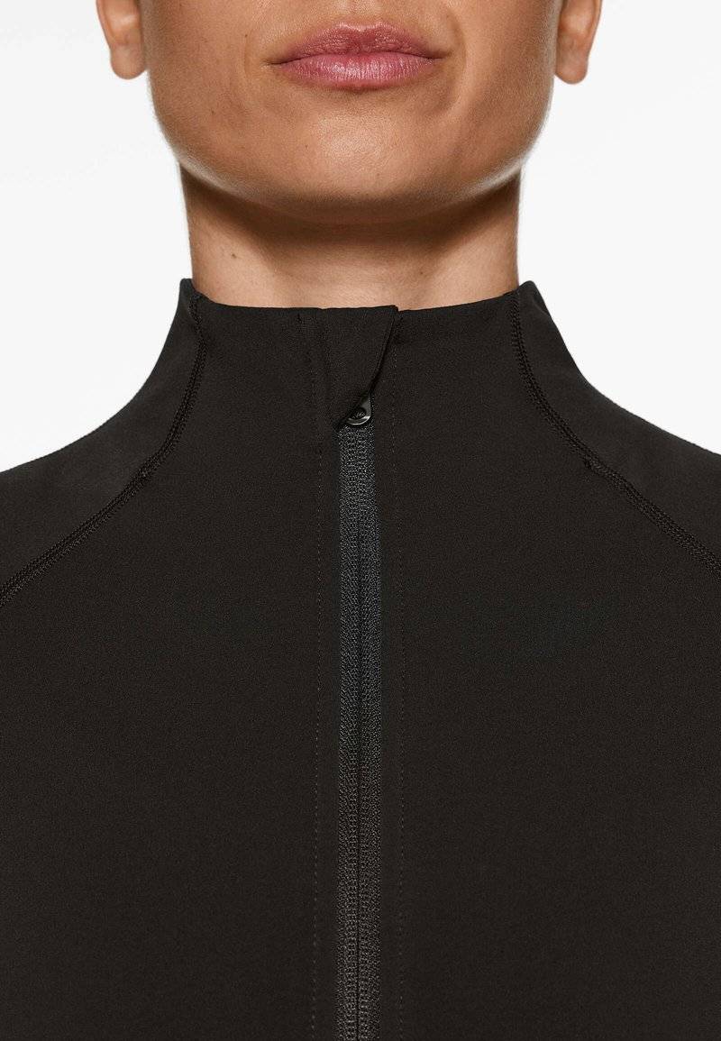 OYSHO OYSHO WARMTH COMFORTLUX TECHNICAL - Training jacket - black Speichern exportieren