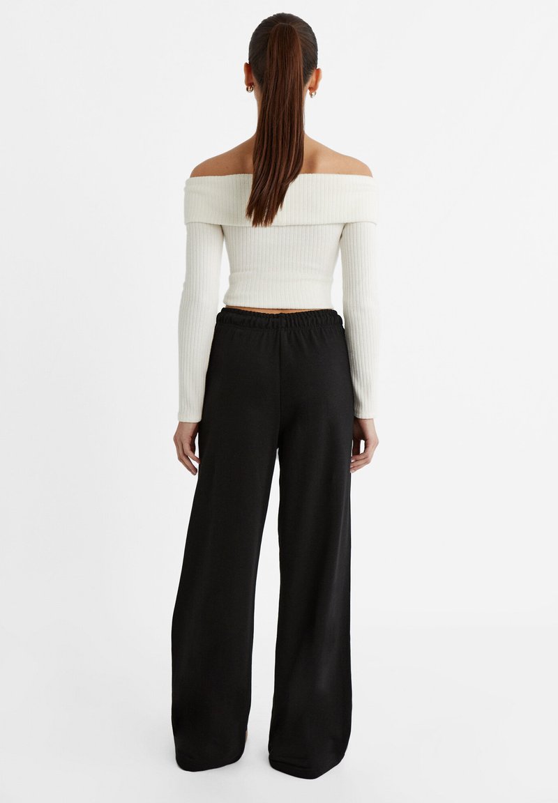 Stradivarius Stradivarius WIDE-LEG JOGGER - Tracksuit bottoms - black Cyber Monday