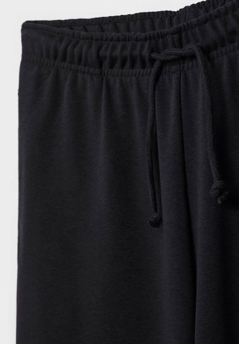 Stradivarius Stradivarius WIDE-LEG JOGGER - Tracksuit bottoms - black Cyber Monday