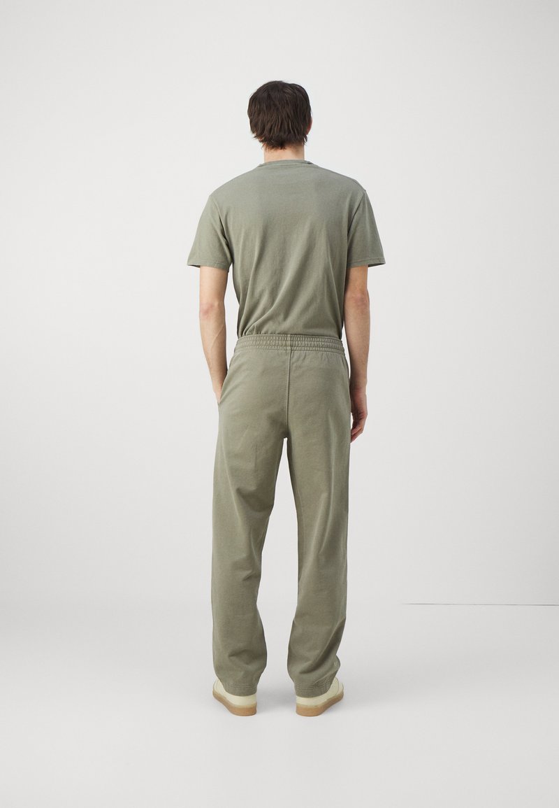 Holzweiler Holzweiler LAGOON OSLO TROUSERS UNISEX - Tracksuit bottoms - green Outlet