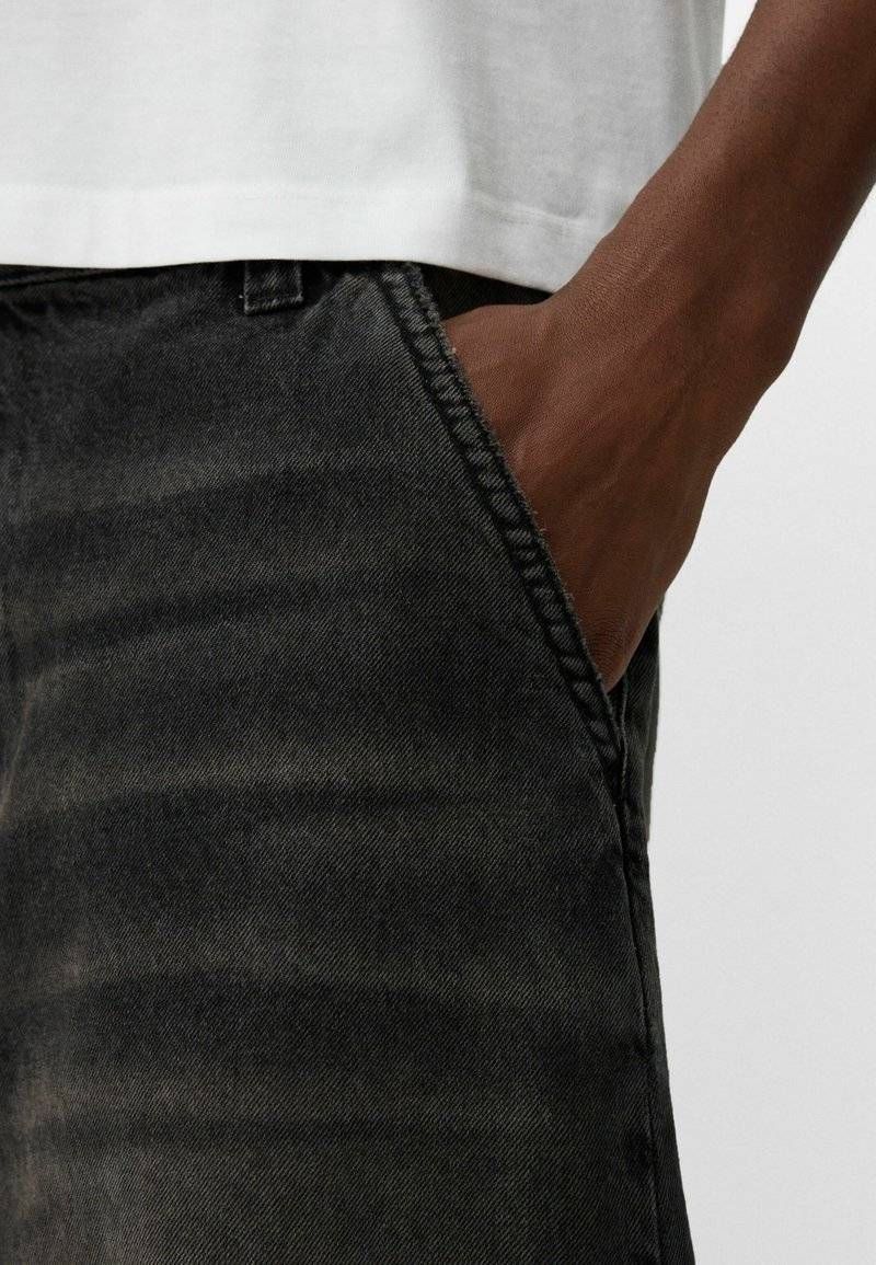 Bershka Bershka Relaxed fit jeans - black denim Meist gekauft