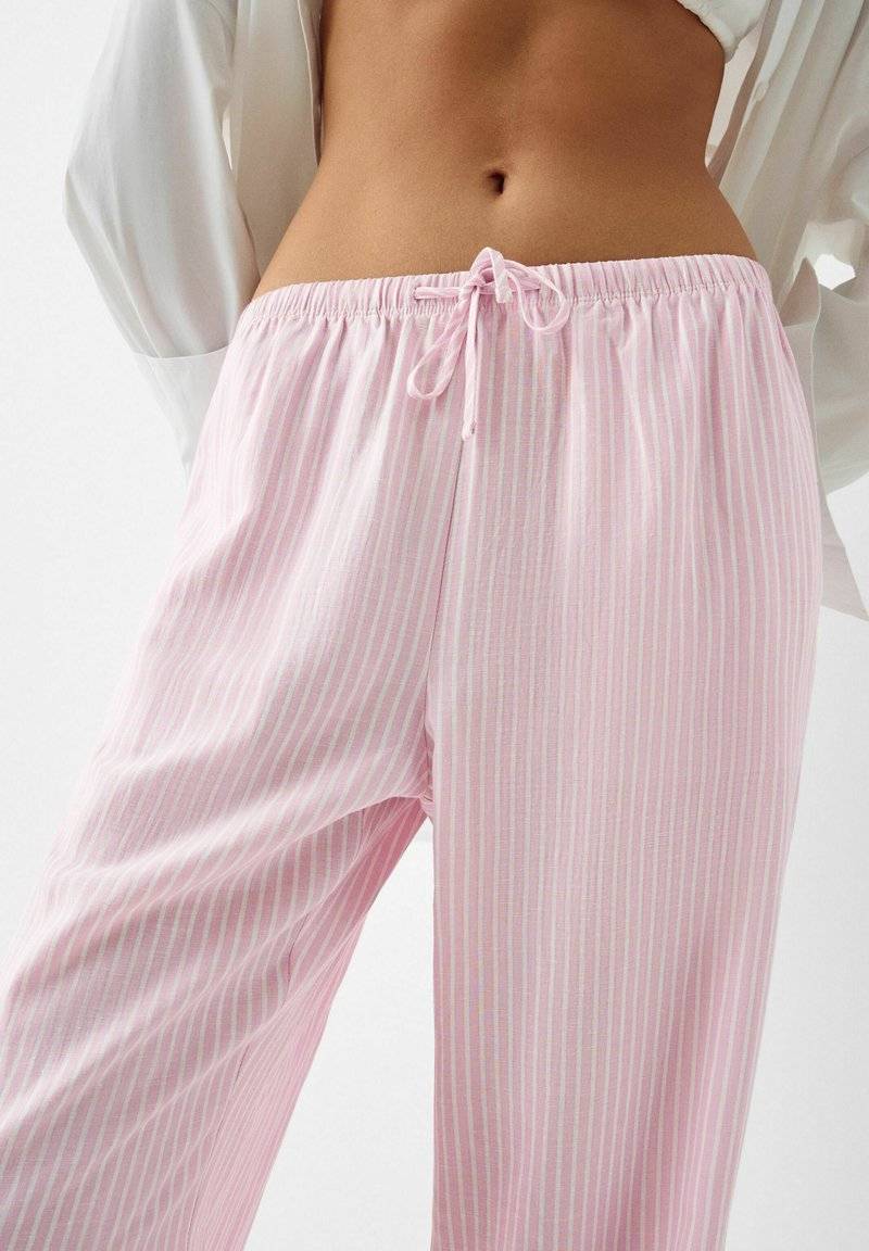 Bershka Bershka WITH AN ELASTIC - Trousers - light pink Preisnachlass