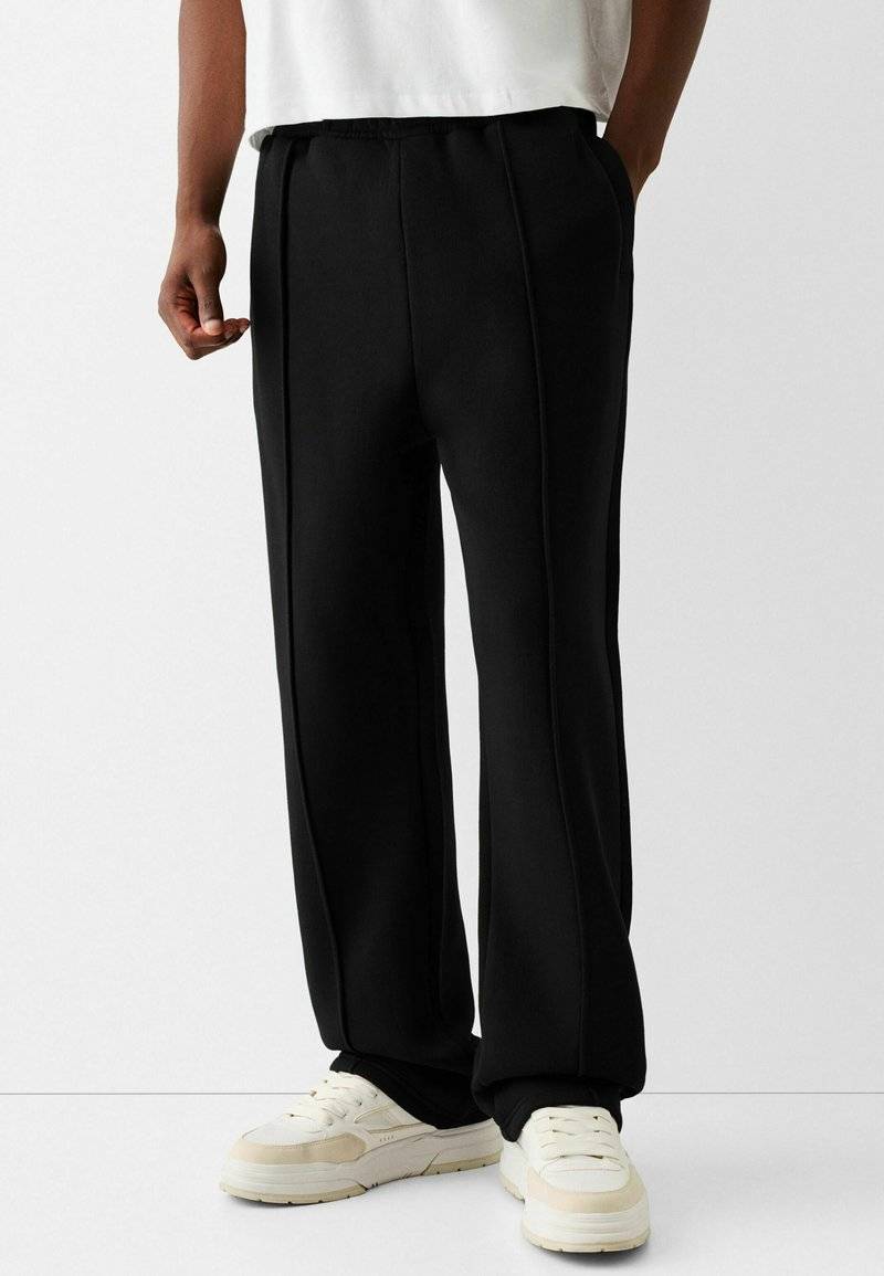 Bershka Bershka WIDE - Tracksuit bottoms - black Osterangebot