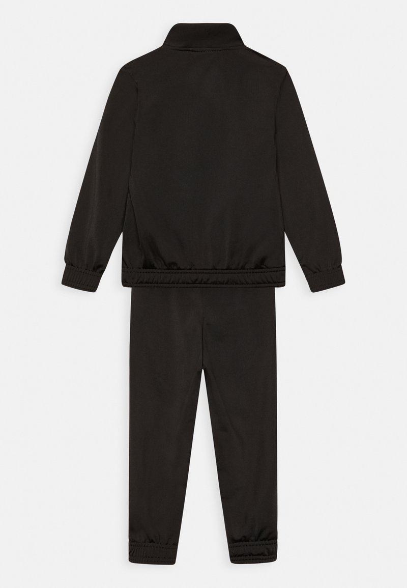 Puma Puma SUIT UNISEX SET - Tracksuit - puma black Vatertagsangebot