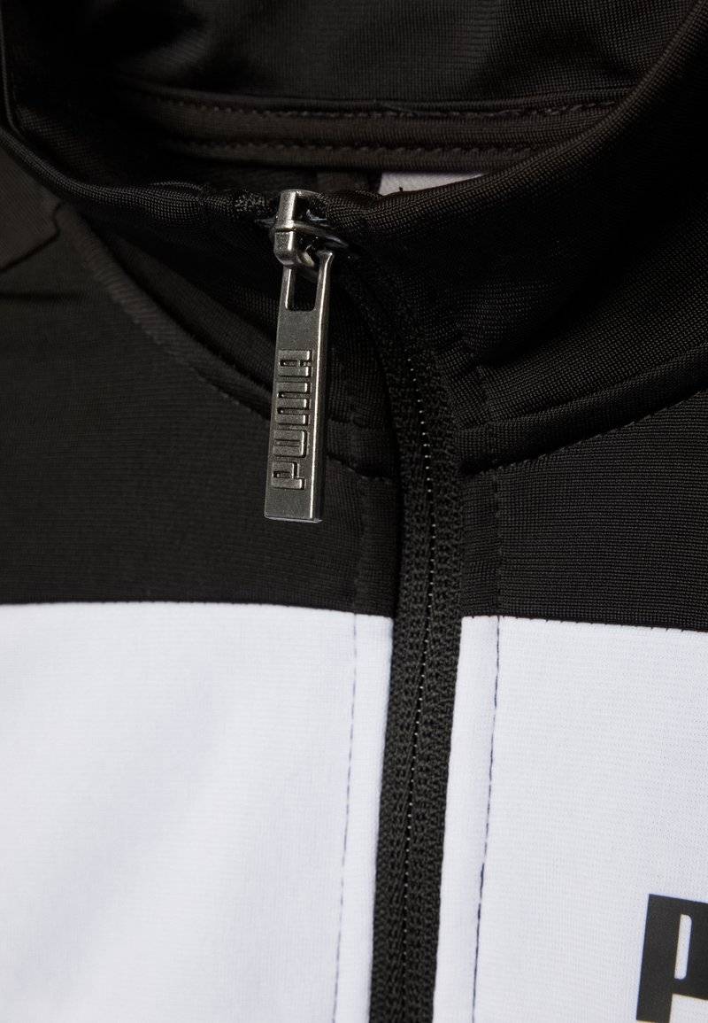 Puma Puma SUIT UNISEX SET - Tracksuit - puma black Vatertagsangebot