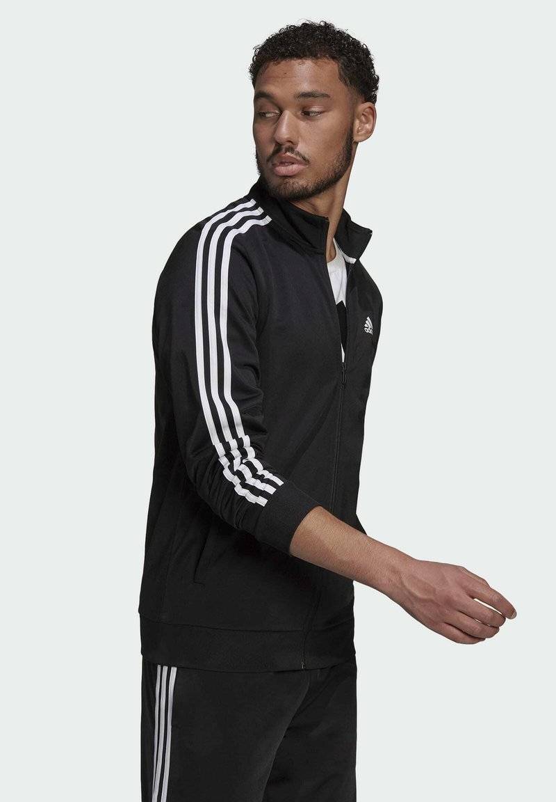 adidas Sportswear adidas Sportswear ESSENTIALS WARM-UP REGULAR 3-STRIPES - Training jacket - black Fabrikladen