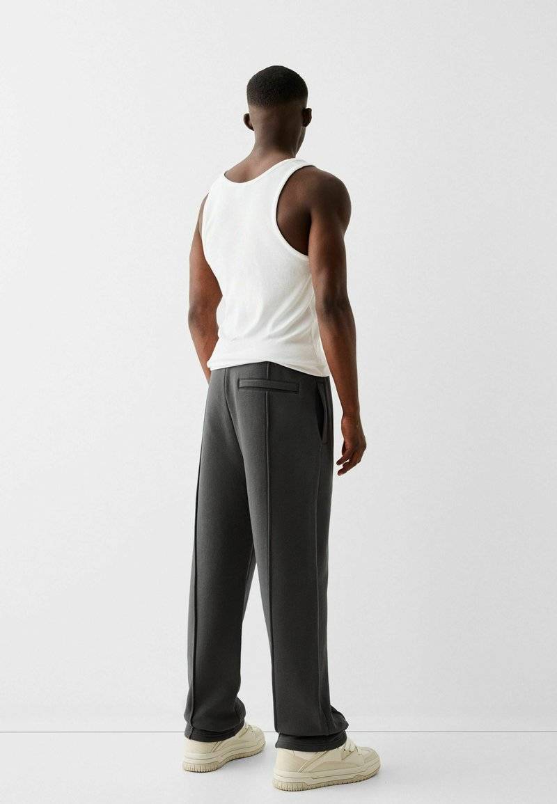 Bershka Bershka WIDE - Tracksuit bottoms - dark grey Begrenztes Angebot