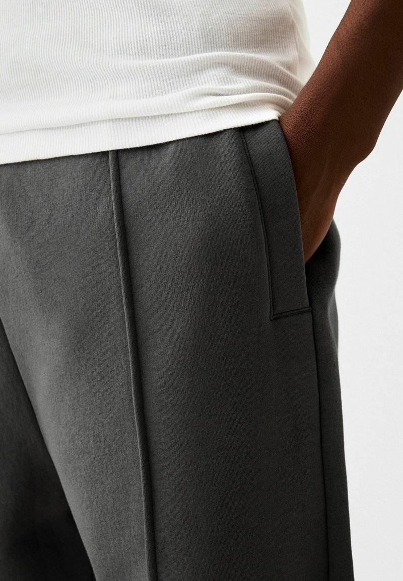 Bershka Bershka WIDE - Tracksuit bottoms - dark grey Begrenztes Angebot