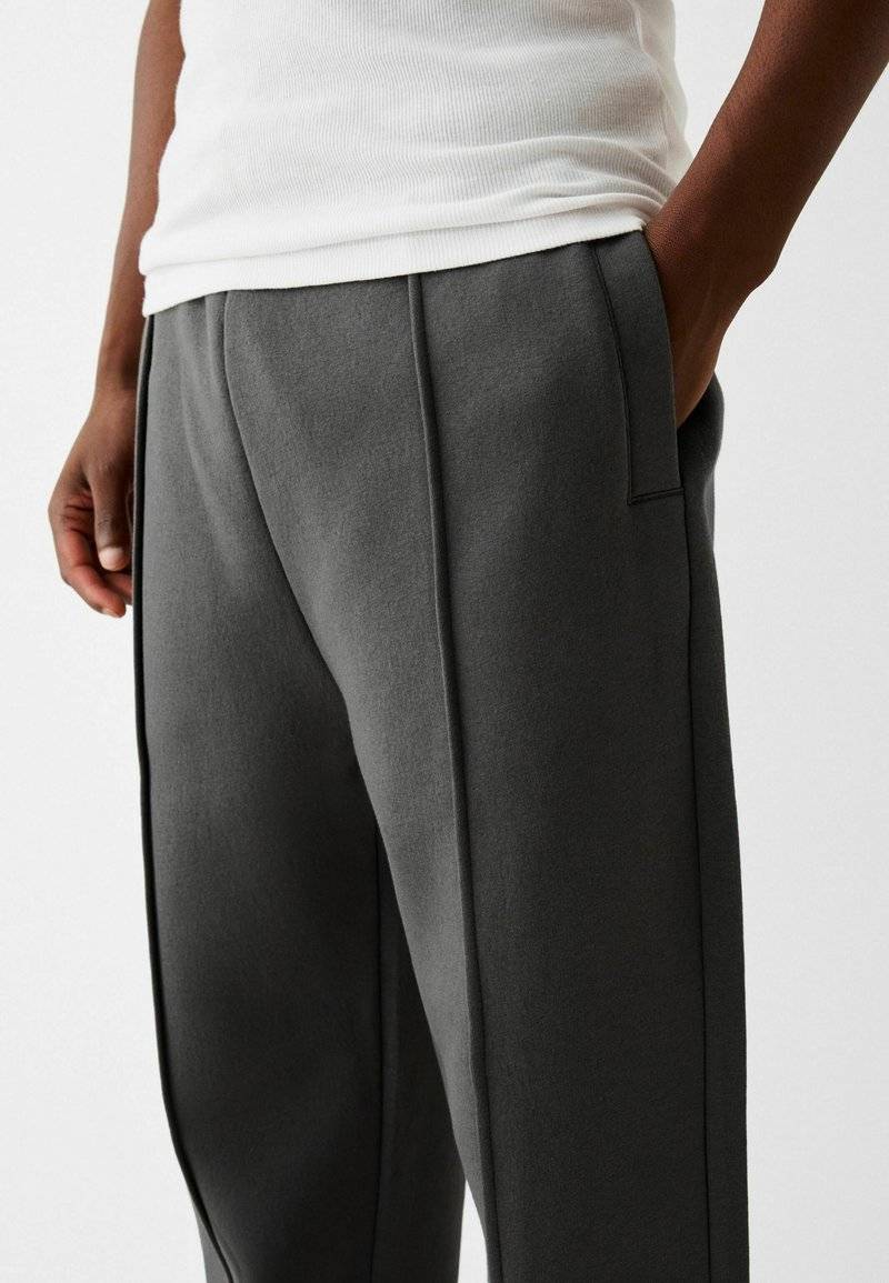 Bershka Bershka WIDE - Tracksuit bottoms - dark grey Begrenztes Angebot