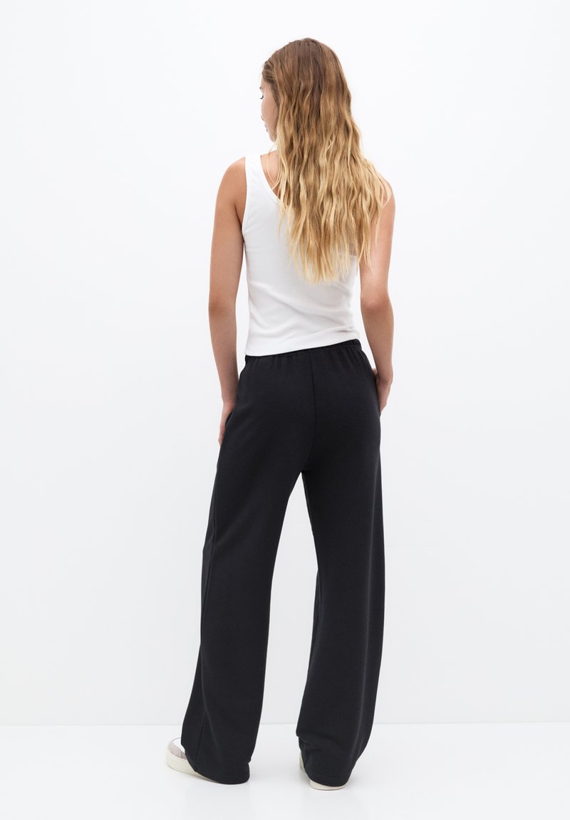 PULL&BEAR PULL&BEAR WIDE-LEG - Tracksuit bottoms - black Muttertagsangebot