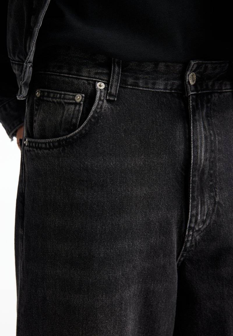 PULL&BEAR PULL&BEAR BAGGY FIT - Straight leg jeans - black Cyber Monday