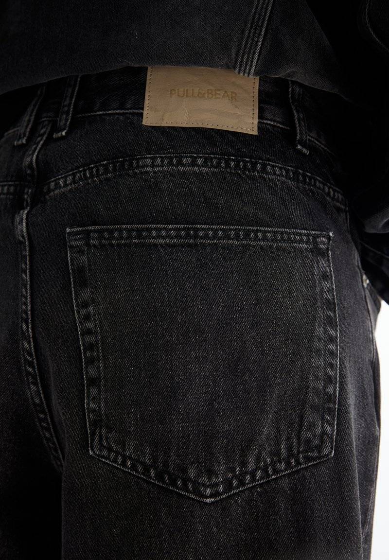PULL&BEAR PULL&BEAR BAGGY FIT - Straight leg jeans - black Cyber Monday