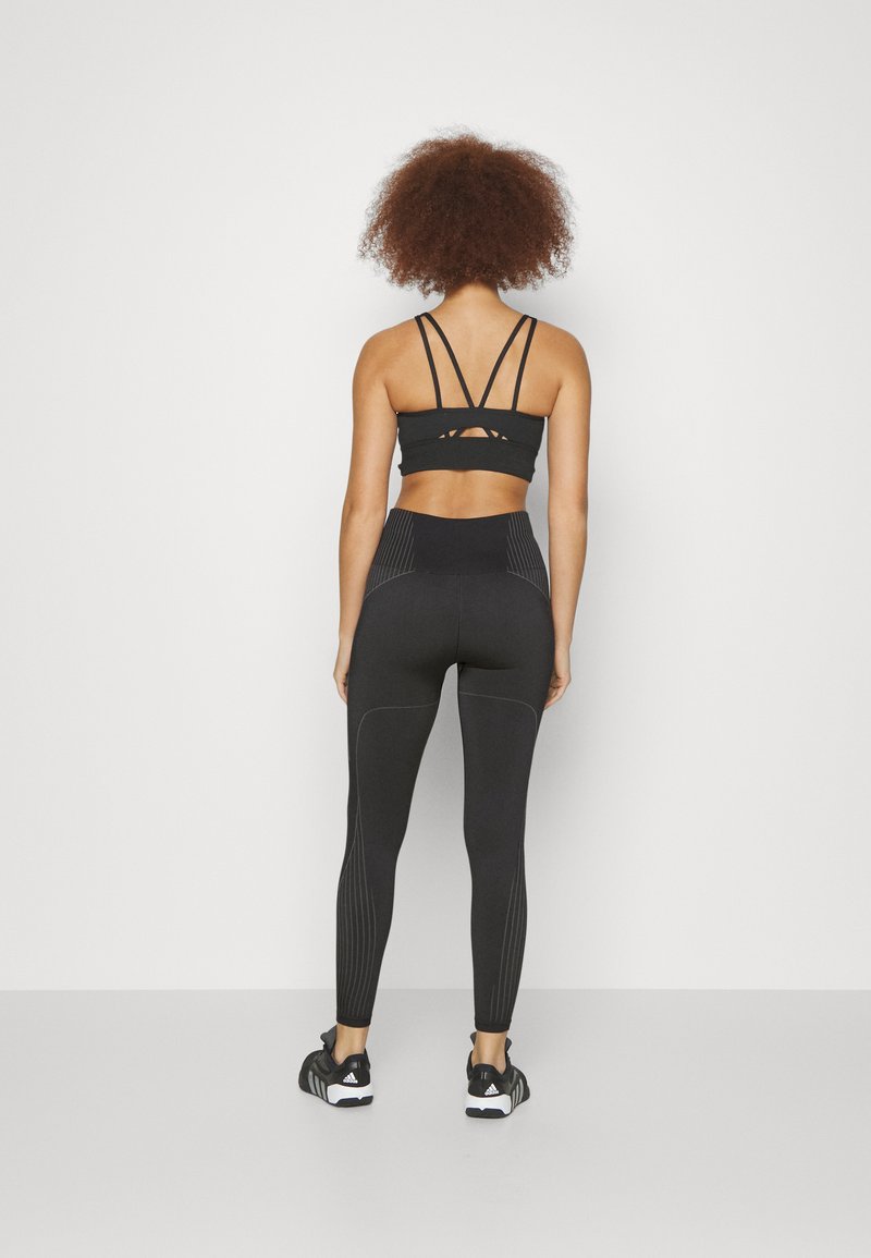 adidas Performance adidas Performance SEAMLESS BRANDED 7/8 - Leggings - black Begrenzt auf 3 Tage