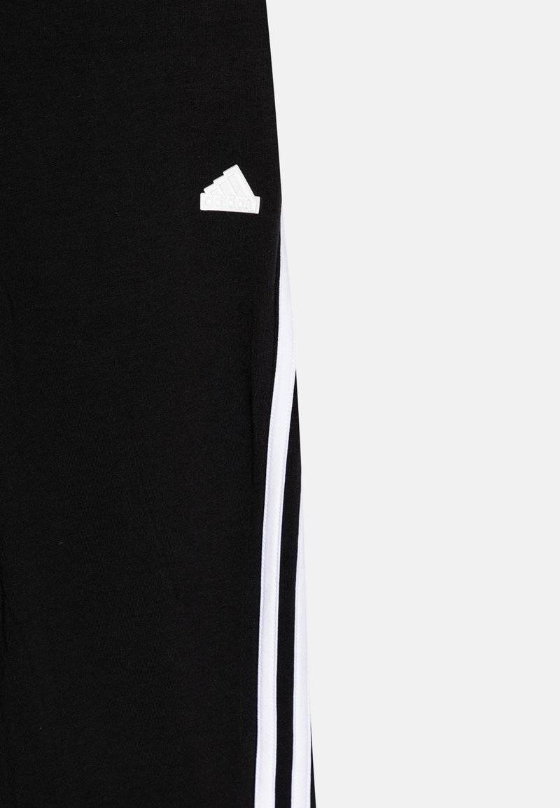 adidas Performance adidas Performance FUTURE ICON 3-STRIPES FLARED - Tracksuit bottoms Black Friday Preise