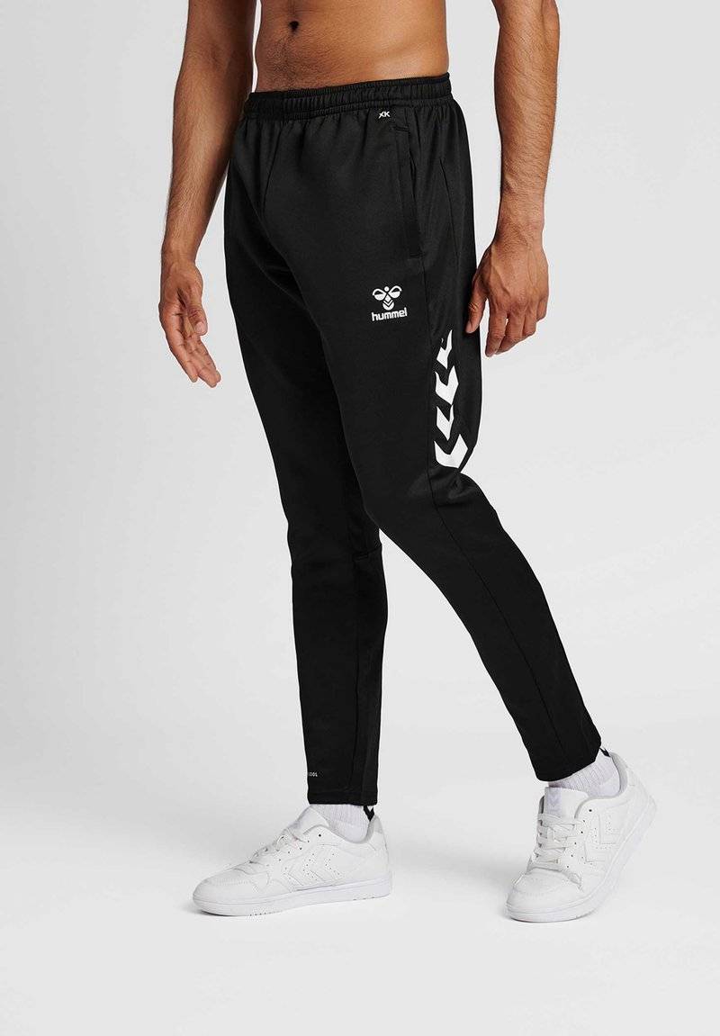 Hummel Hummel CORE XR TRAINING PANTS - Tracksuit bottoms - black Online Outlet
