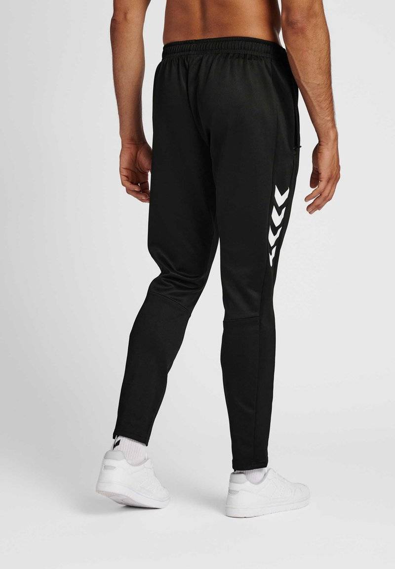 Hummel Hummel CORE XR TRAINING PANTS - Tracksuit bottoms - black Online Outlet