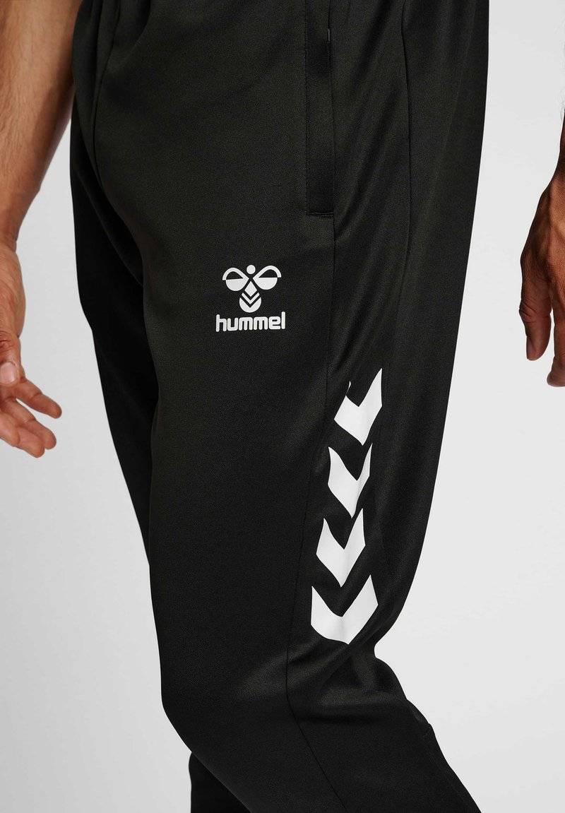 Hummel Hummel CORE XR TRAINING PANTS - Tracksuit bottoms - black Online Outlet