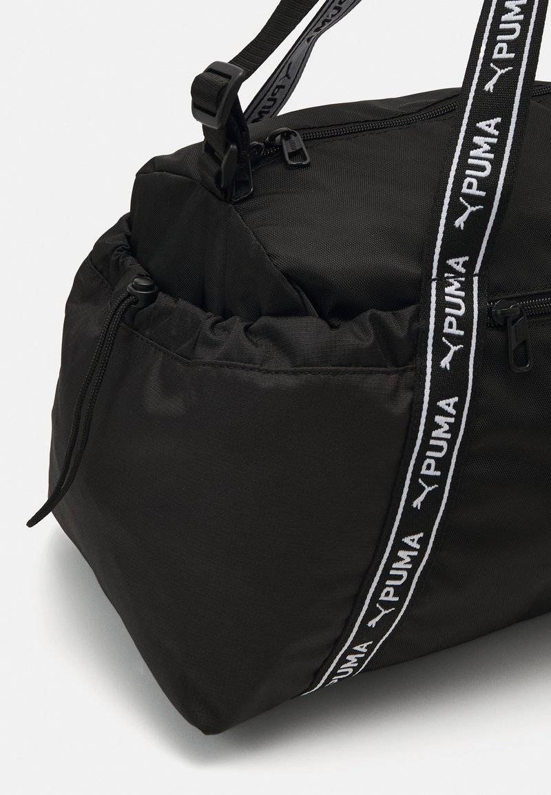 Puma Puma SPORT BAG - Sports bag - black Räumungsverkauf