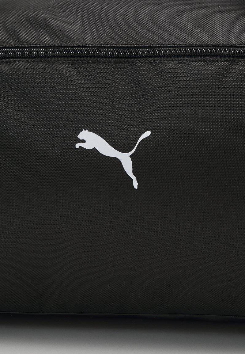 Puma Puma SPORT BAG - Sports bag - black Räumungsverkauf
