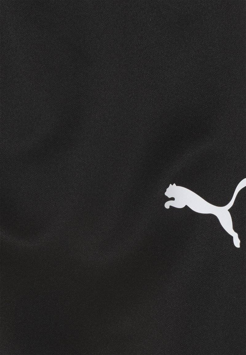 Puma Puma TEAMRISE POLY TRAINING UNISEX - Tracksuit bottoms Letzte 2 Tage