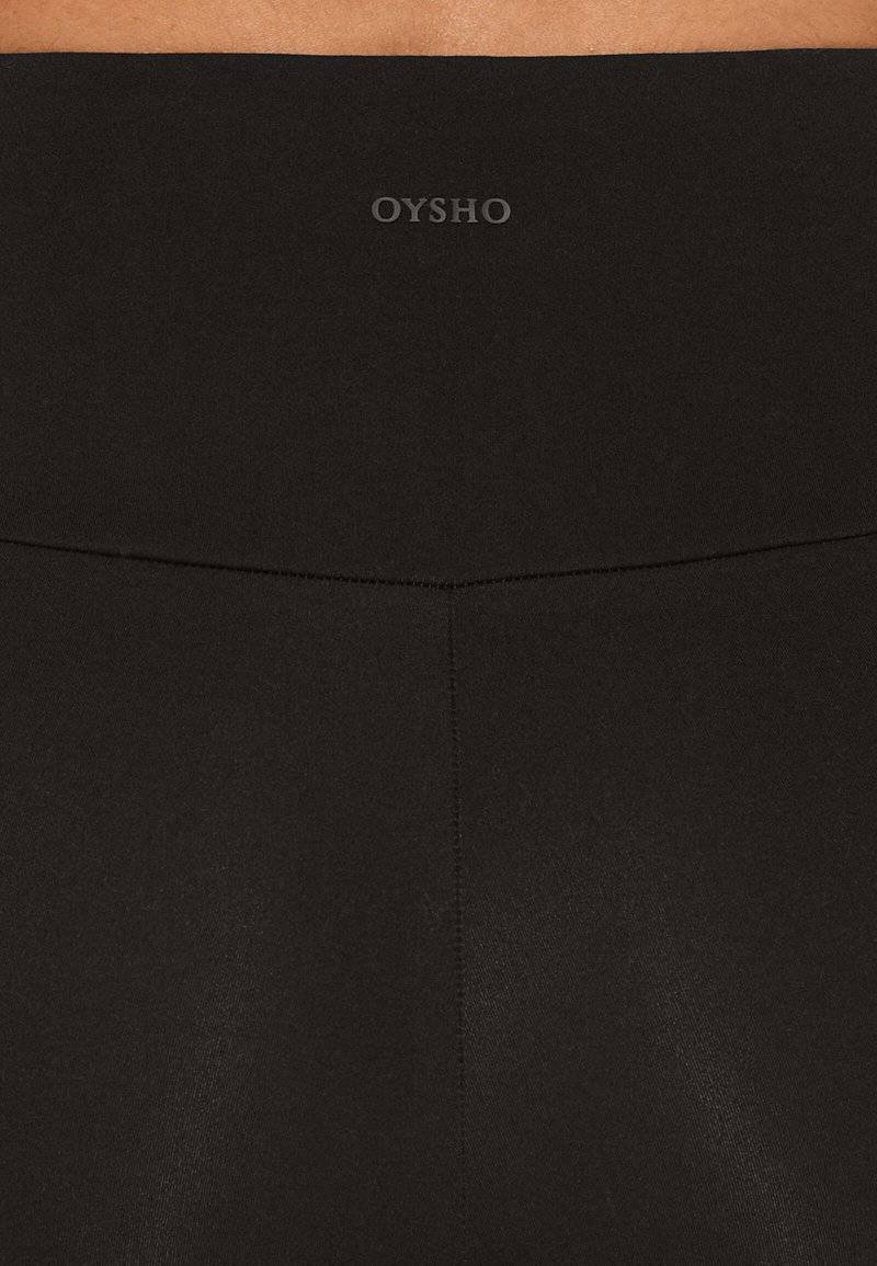 OYSHO OYSHO COMFORTLUX HIGH-RISE BIKER 20cm - Leggings - black Nur noch ein Tag übrig