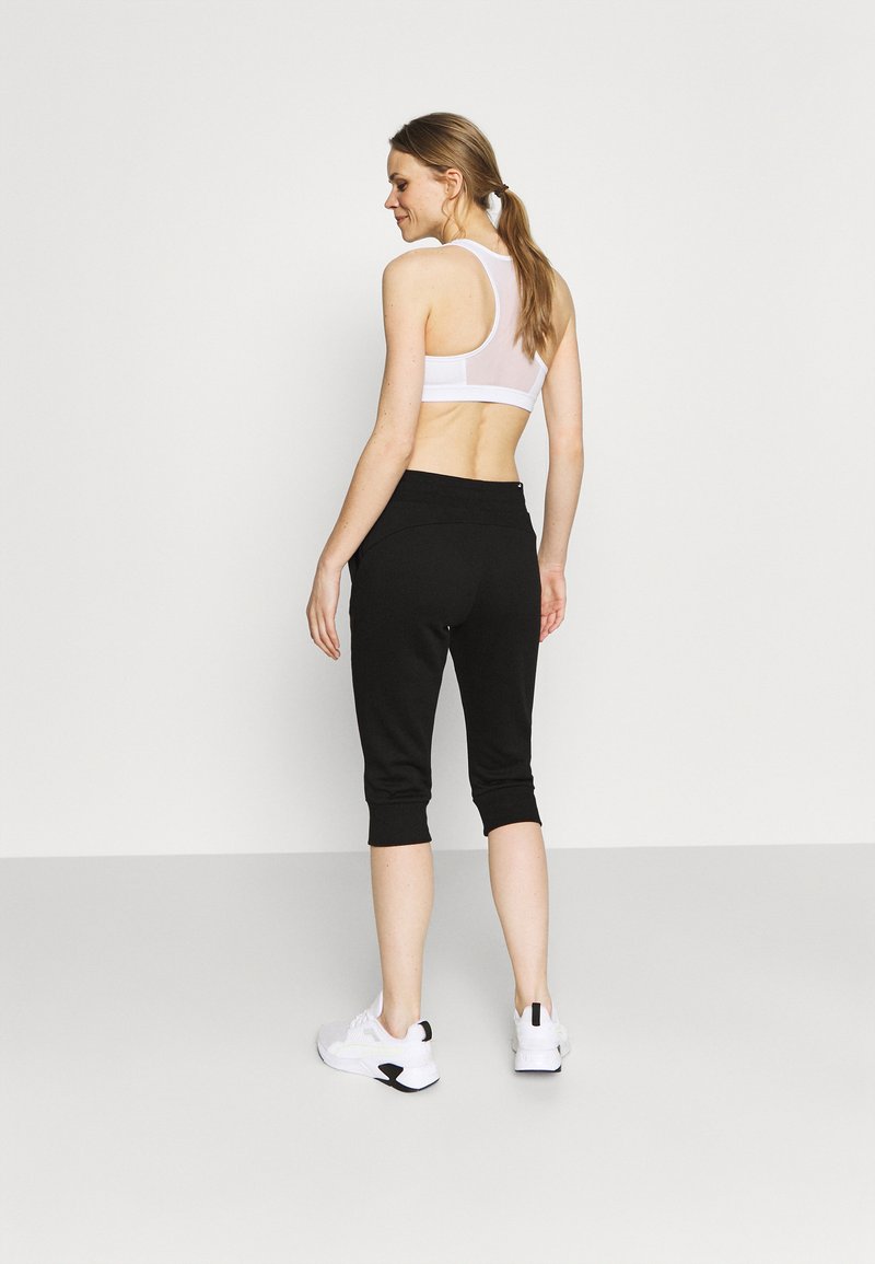 Puma Puma CAPRI - 3/4 sports trousers - black Begrenztes Angebot