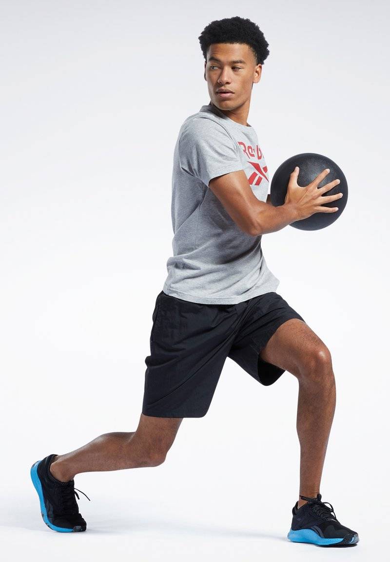 Reebok Reebok ID TRAIN UTILITY - Sports shorts - black VIP-Rabatte
