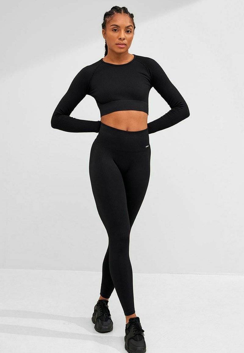 aim’n® aim’n® RIBBED SEAMLESS - Leggings - black Riesige Rabatte