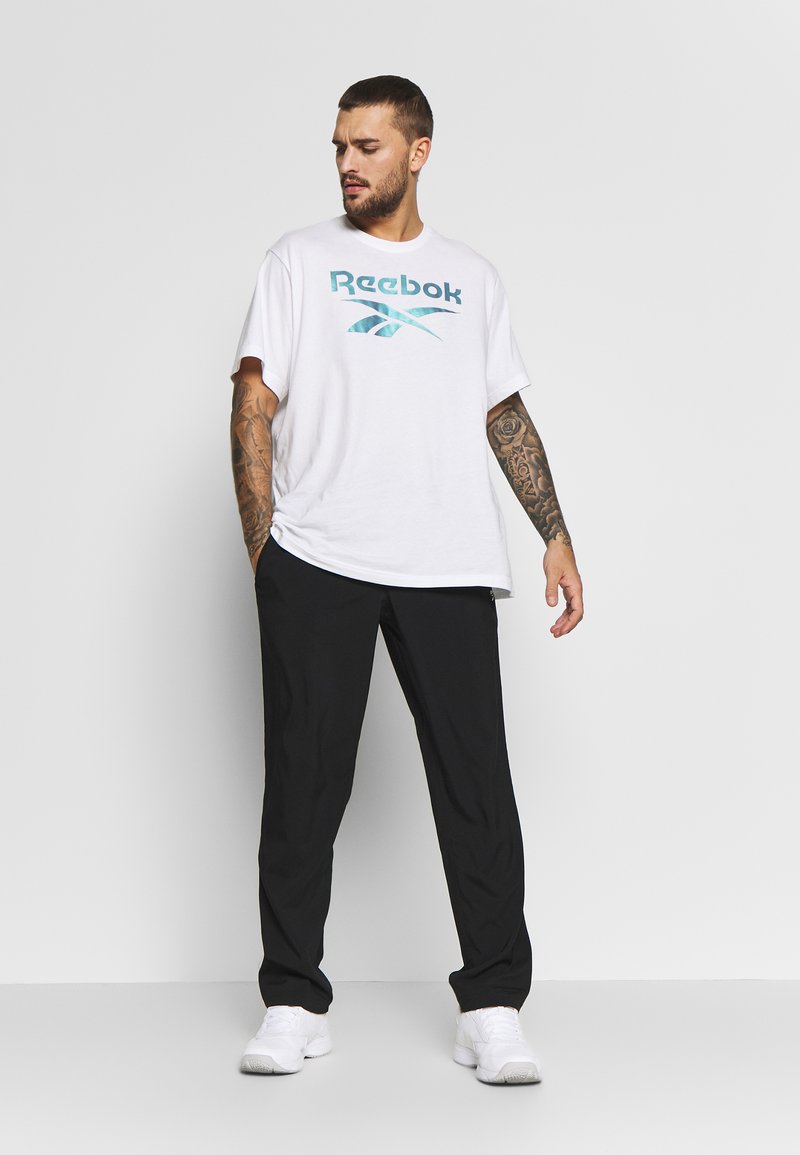 Reebok Reebok TRAINING ESSENTIALS WOVEN SPEEDWICK WORKOUT READY - Trousers - black Große Rabatte