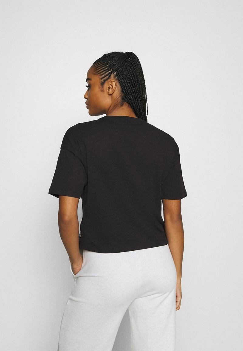 Puma Puma CROPPED LOGO TEE - Print T-shirt - puma black Große Rabatte