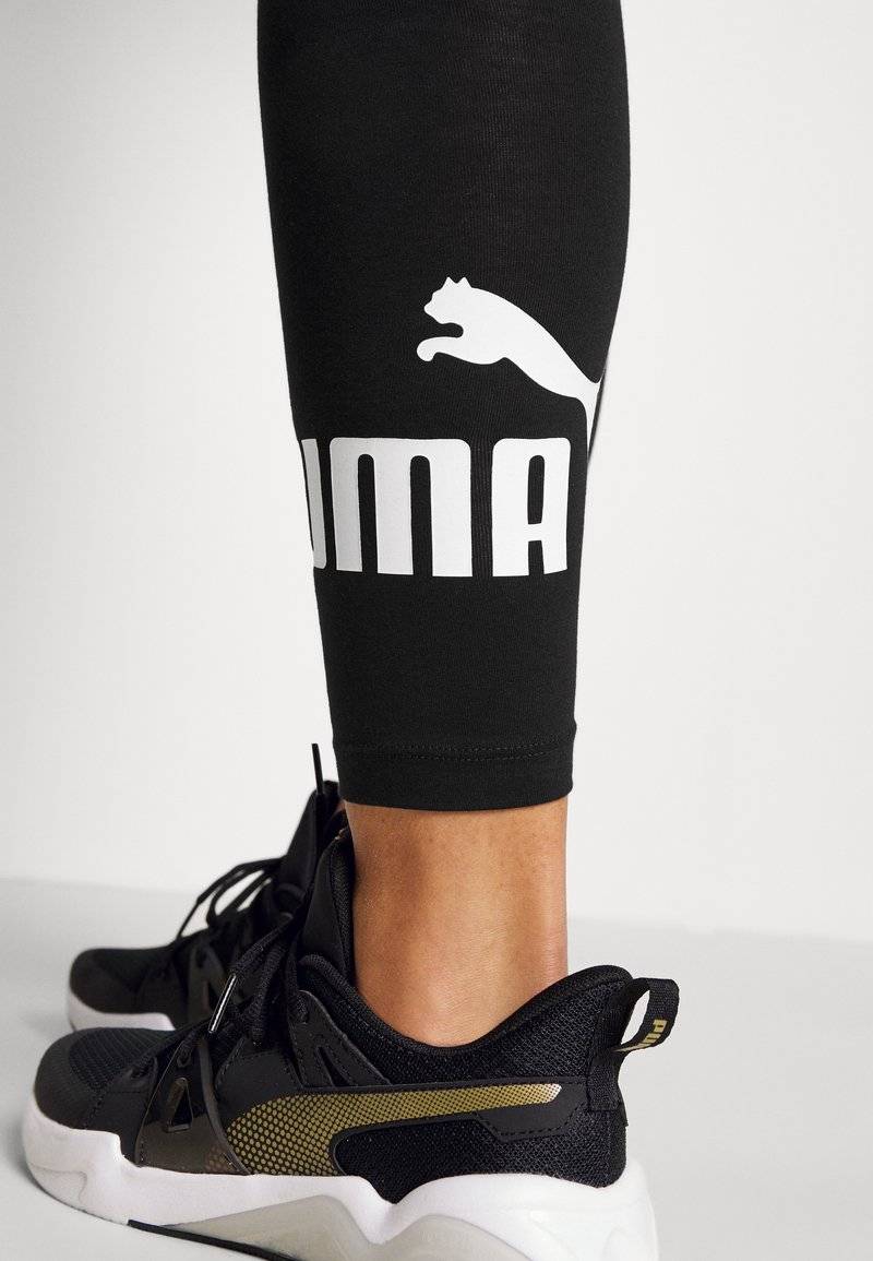 Puma Puma LOGO LEGGINGS - Leggings - black Vierteljährliche Förderung