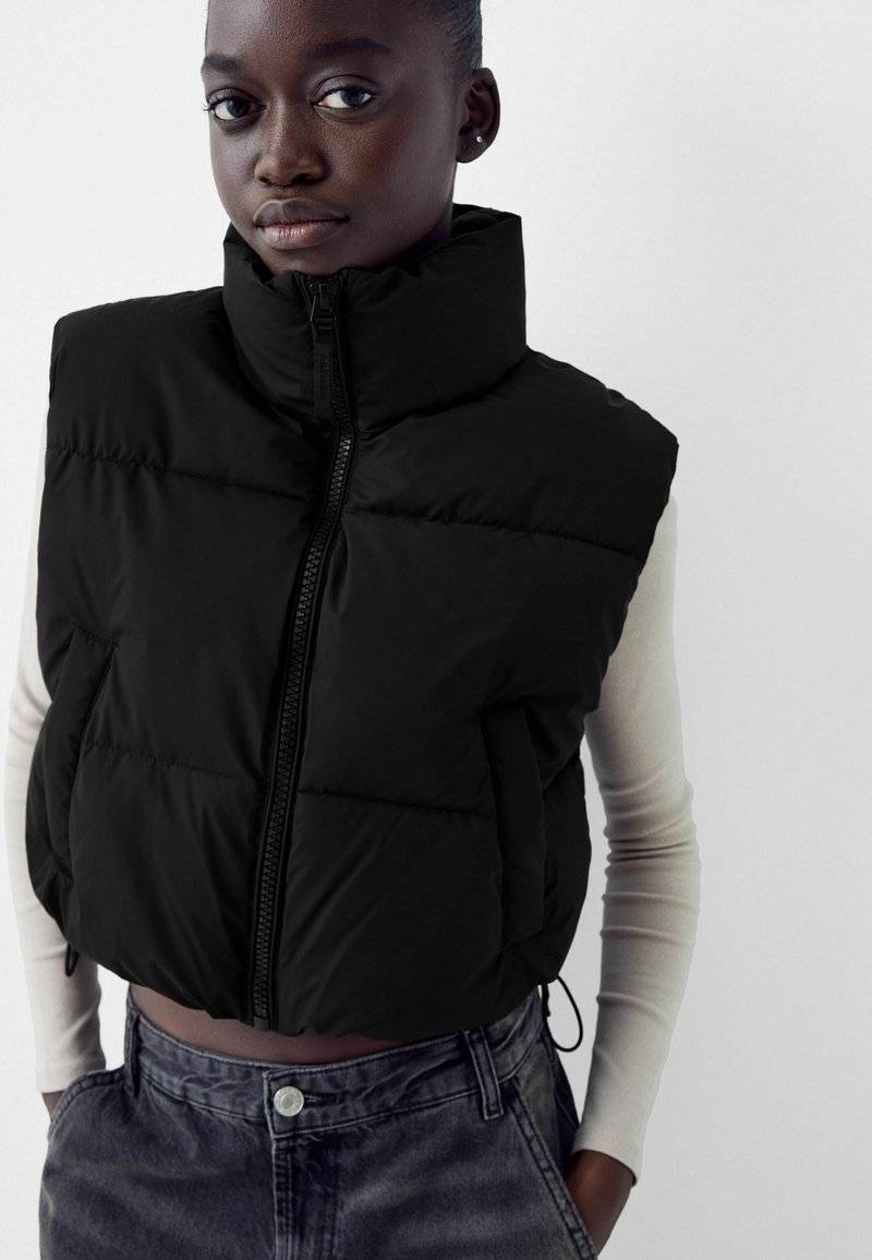 Bershka Bershka CROPPED PUFFER - Waistcoat - black denim Riesige Ersparnisse