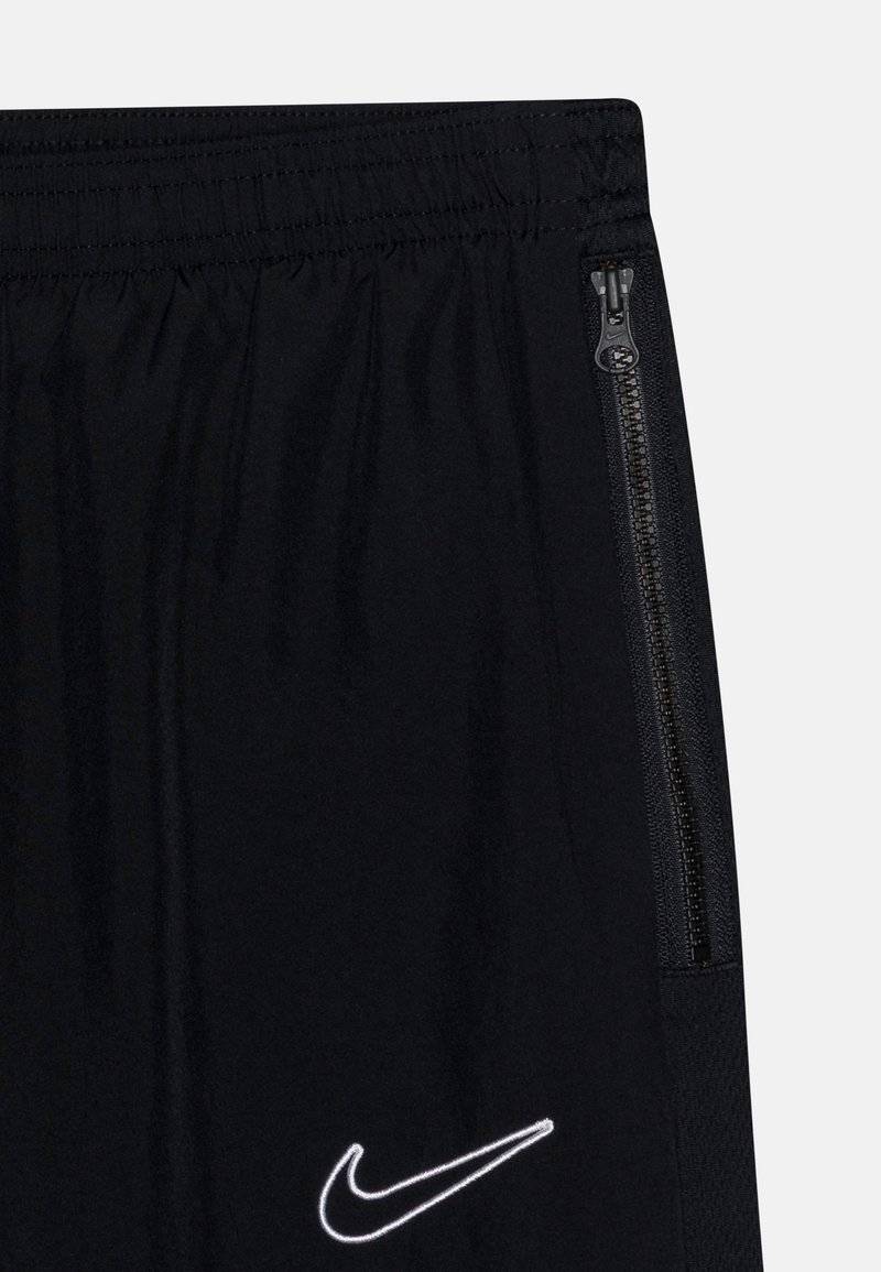 Nike Performance Nike Performance ACADEMY 23 TRACK PANT UNISEX - Tracksuit bottoms Fabrikladen