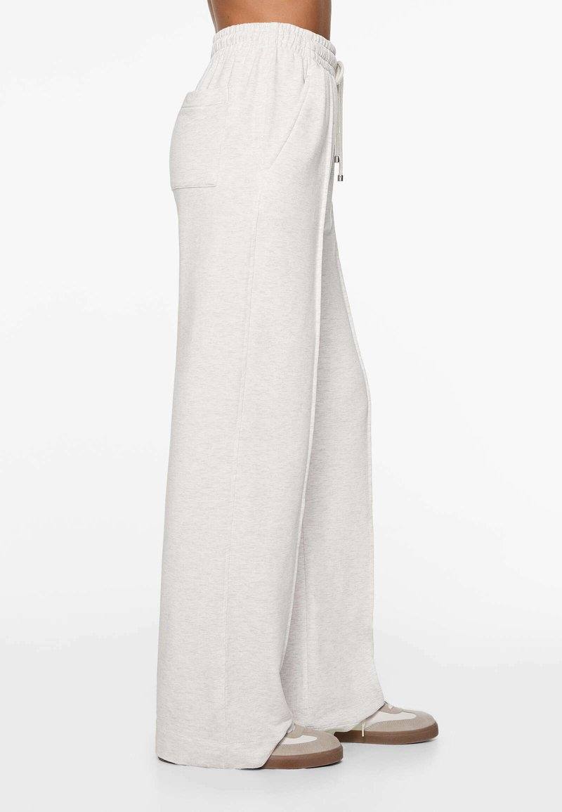 OYSHO OYSHO SOFT TOUCH RELAXED STRAIGHT-LEG - Tracksuit bottoms - mottled light grey Speichern exportieren