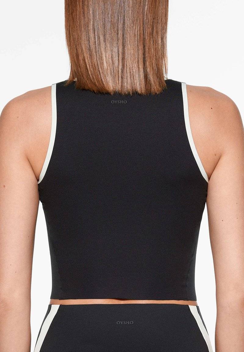 OYSHO OYSHO PERFECT-ADAPT PIPING - Sports T-shirt - black Sonderangebot der Fabrik