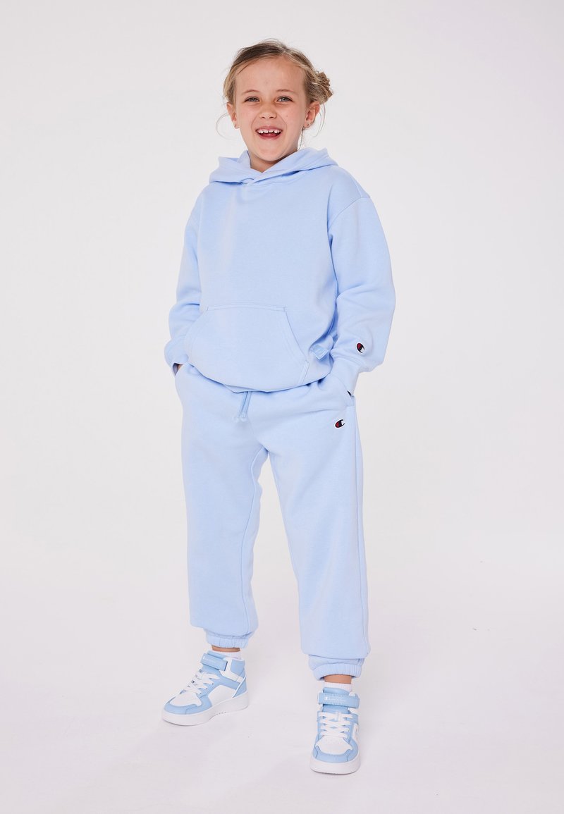 Champion Champion EXCLUSIVE PANT UNISEX - Tracksuit bottoms - light blue Vierteljährliche Förderung