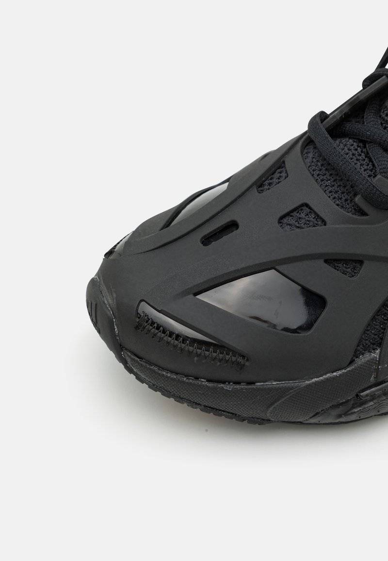 adidas by Stella McCartney adidas by Stella McCartney ADIDAS BY STELLA MCCARTNEY SOLAR GLIDE - Competition running shoes - core black Bis zu 55% Rabatt
