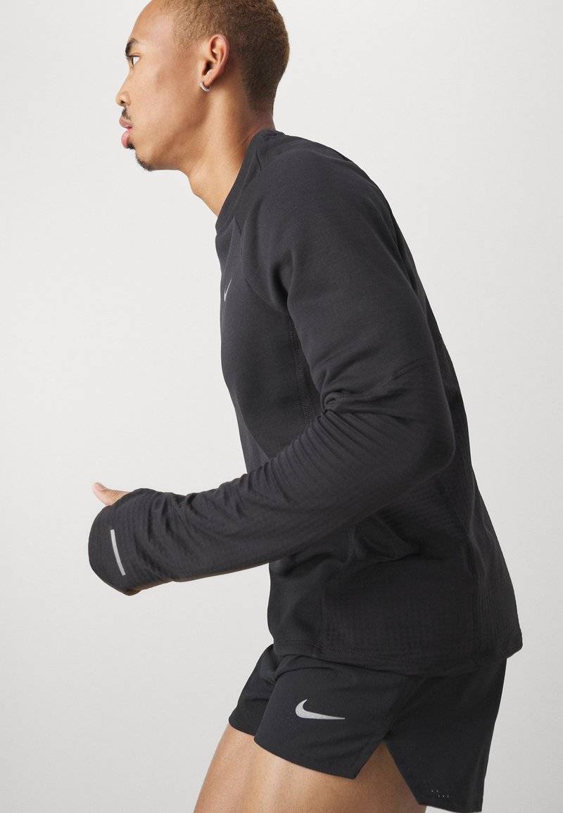 Nike Performance Nike Performance FAST SHORT - Sports shorts Online
