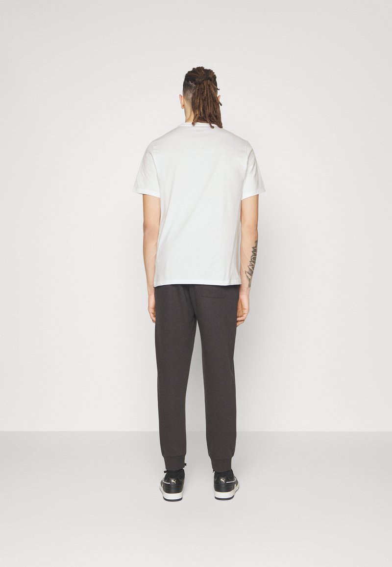 Converse Converse GO TO STAR CHEVRON TEE UNISEX - Print T-shirt - white Limitierter Zeitrabatt