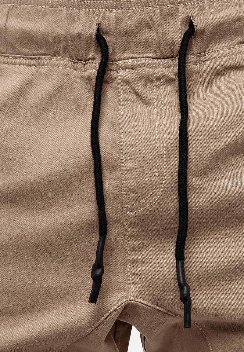 Tazzio Tazzio Cargo trousers - beige Blitzverkäufe
