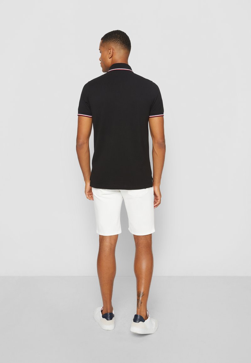 Tommy Hilfiger Tommy Hilfiger TIPPED SLIM - Polo shirt - black Saisonschlussverkauf