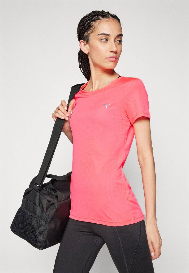 Puma Puma PERFORMANCE TEE - Sports T-shirt - sunset glow Weihnachtsangebot
