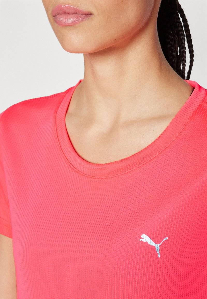 Puma Puma PERFORMANCE TEE - Sports T-shirt - sunset glow Weihnachtsangebot