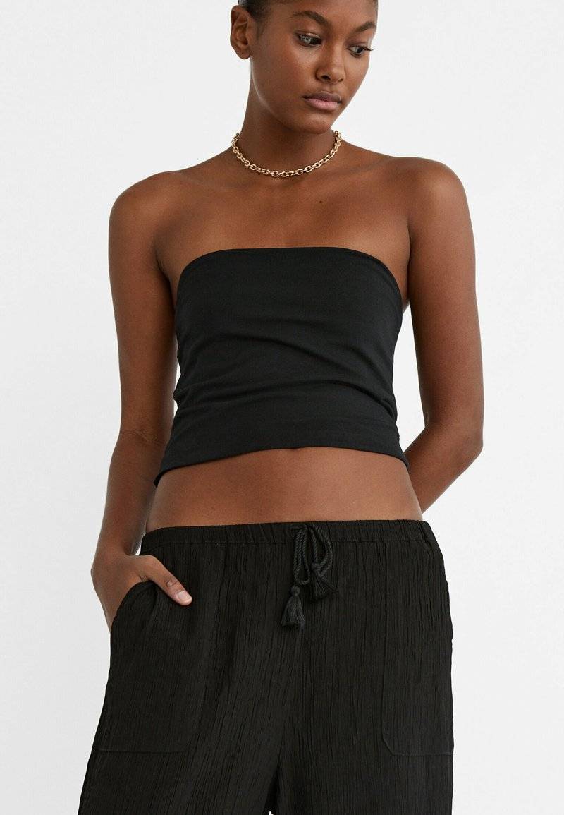 Stradivarius Stradivarius FLOWING CULOTTES - Trousers - black Muttertagsangebot