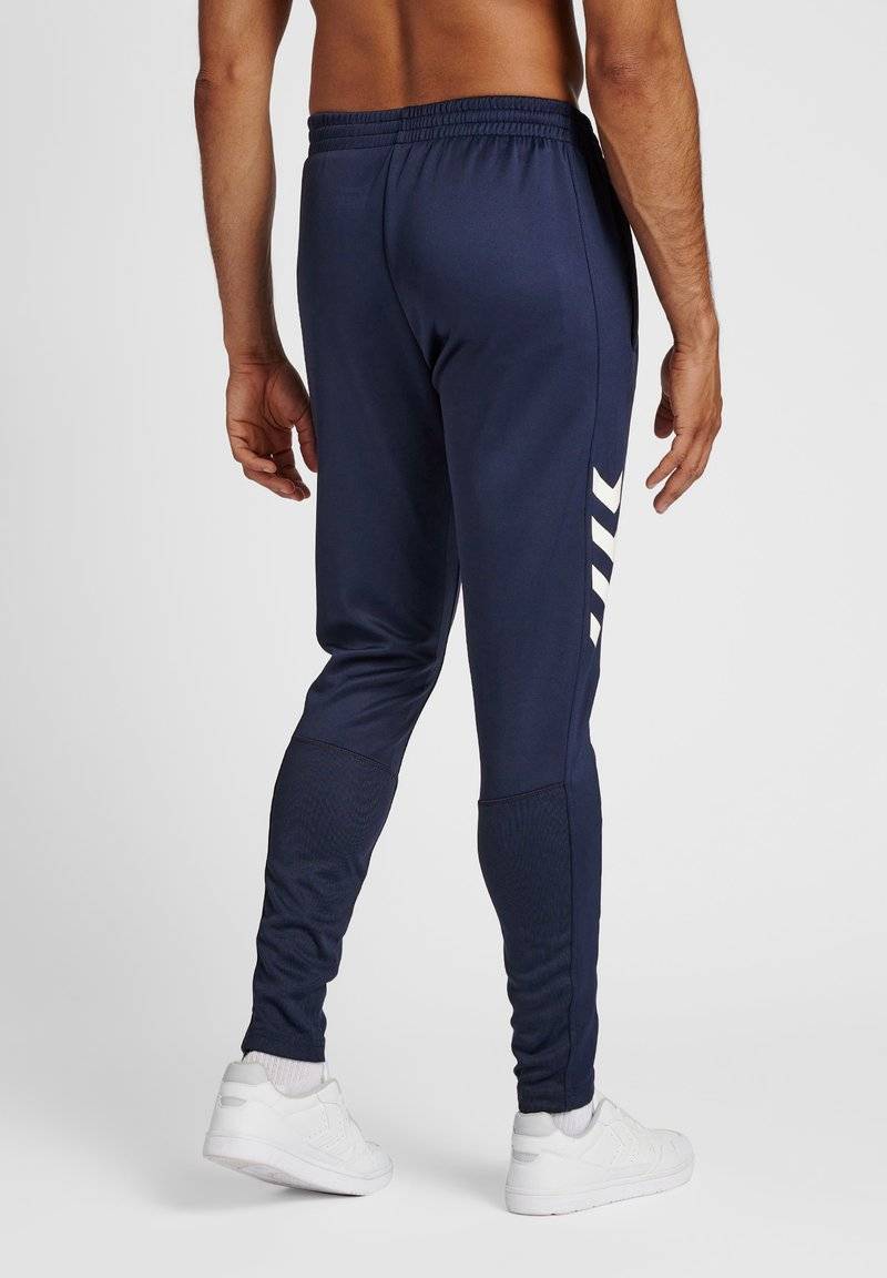 Hummel Hummel CORE XR TRAINING PANTS - Tracksuit bottoms - marine Neueste Mode