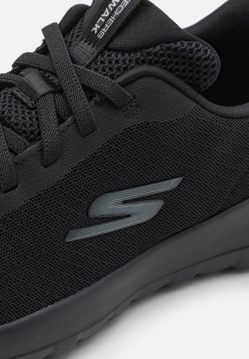 Skechers Performance Skechers Performance GO WALK BUNGEE - Walking trainers - black Neuheiten